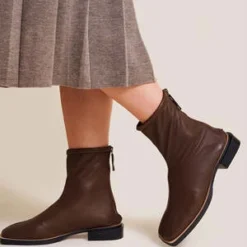 About ArianneCaoba Dean Boots - Dark Brown